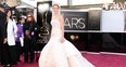 Jennifer Lawrence attends the Oscars 2013 red carp